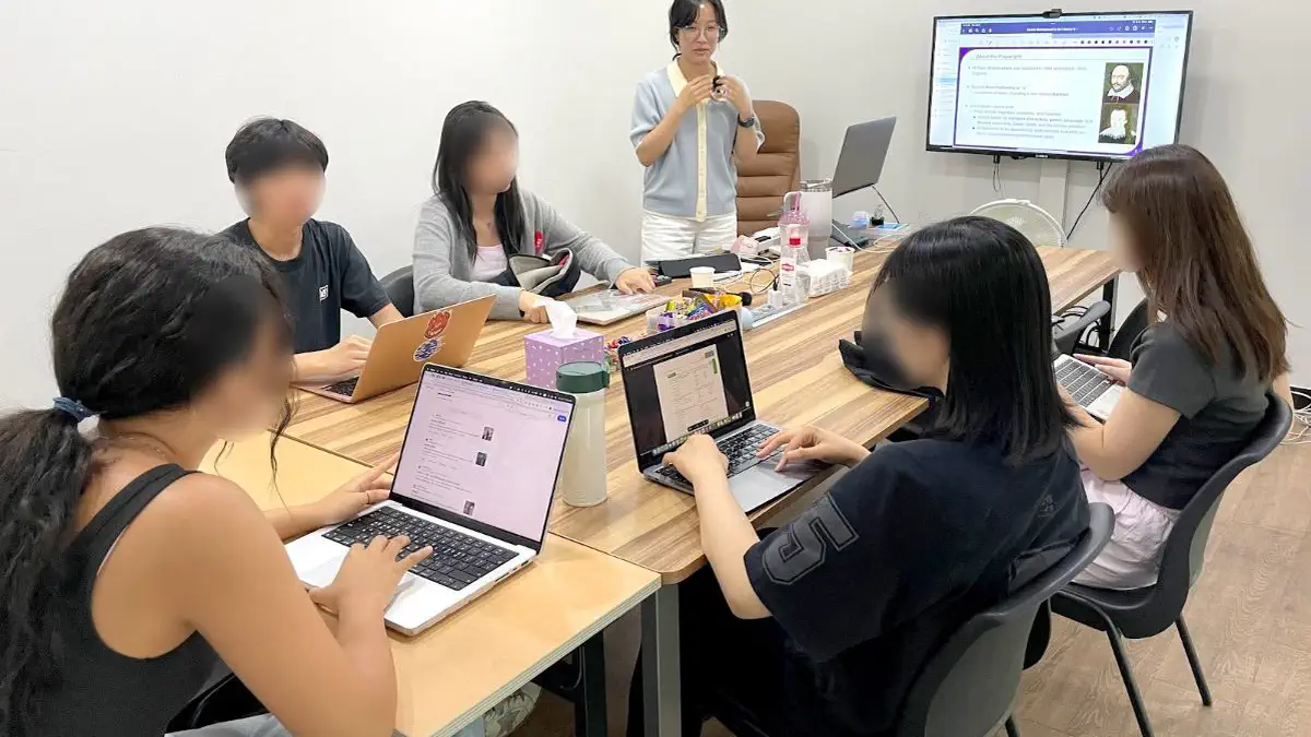 Cindy's English class, a small group around one table